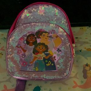 A child’s bag with sequins purple in very good condition